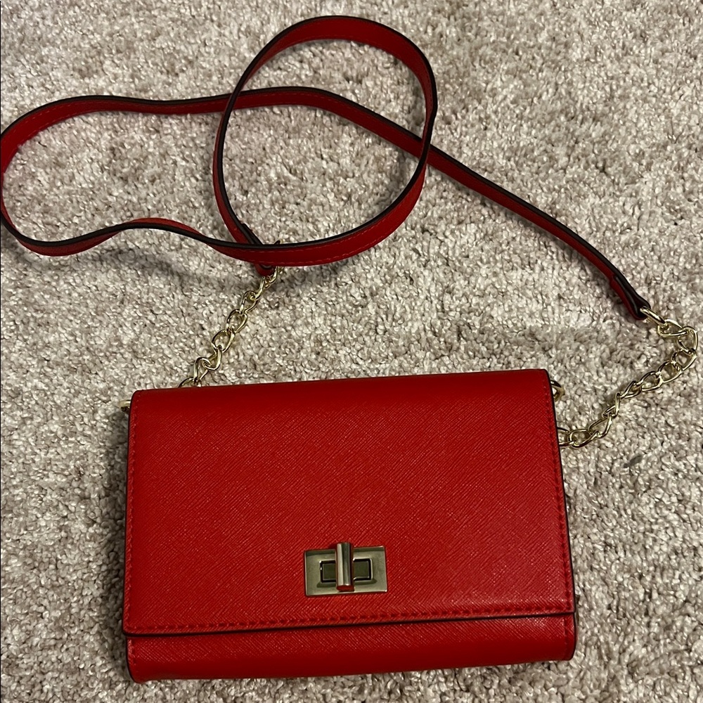 Sleek Red Crossbody Bag with Gold Accents